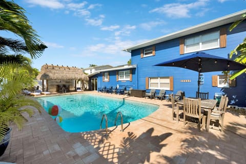 Property building, Patio, Pool view, Swimming pool, sunbed