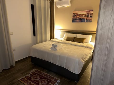 Bed, Photo of the whole room, Bedroom, towels, wardrobe, air conditioner