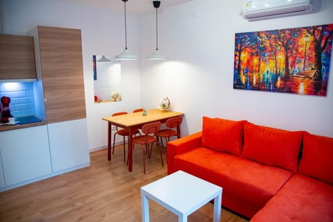 Kitchen or kitchenette, Living room, Seating area, Dining area, air conditioner