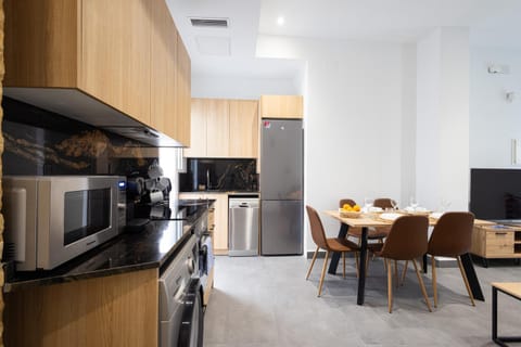 TV and multimedia, Kitchen or kitchenette, Living room, Seating area, Dining area, dishwasher, oven, stove, toaster