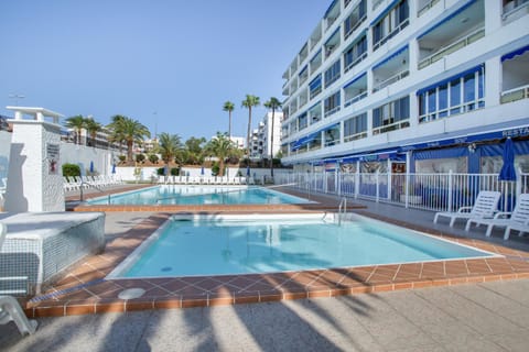 Property building, Living room, Swimming pool