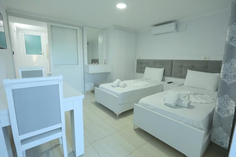 Bed, Photo of the whole room, Bedroom, towels, air conditioner