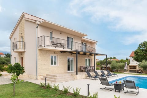 Property building, Patio, Day, Garden, View (from property/room), Balcony/Terrace, Balcony/Terrace, Garden view, Pool view, Swimming pool, sunbed