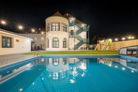 Property building, Night, Swimming pool