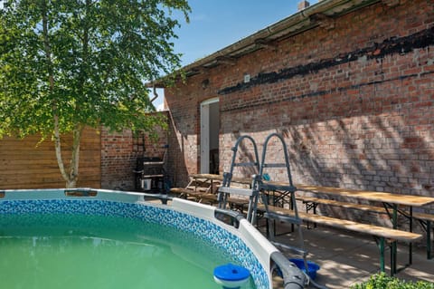 Property building, Living room, Swimming pool