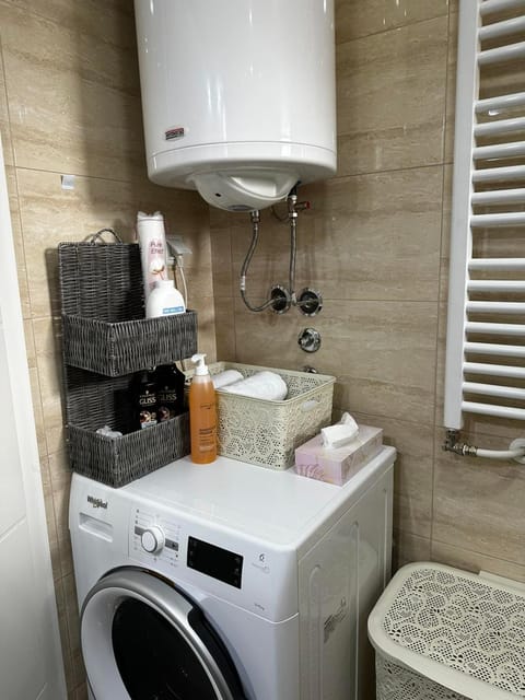 Bathroom, towels, washing machine, dryer
