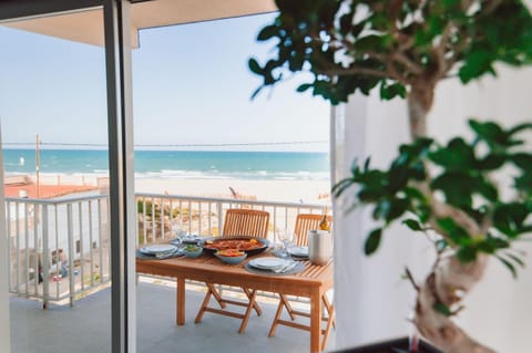 View (from property/room), Balcony/Terrace, Seating area, Dining area, Beach, Sea view