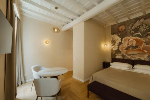 Bed, Seating area, Dining area, Bedroom