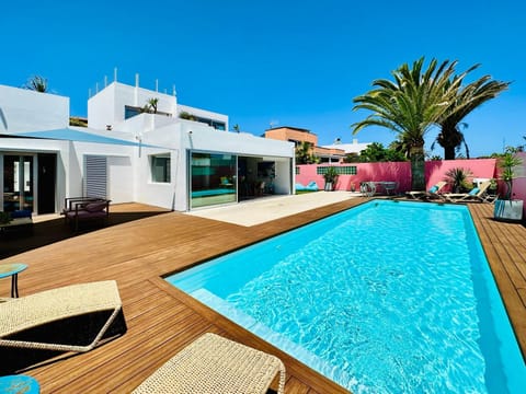 Property building, Living room, Swimming pool