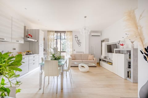 Kitchen or kitchenette, Living room, Dining area, dishwasher, oven, stove, toaster, air conditioner