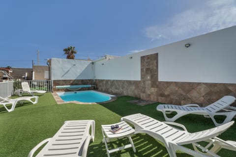 Property building, Living room, Swimming pool