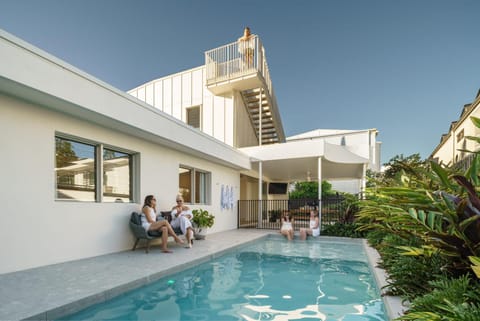 Property building, Patio, People, Pool view, Swimming pool, group of guests, sunbed