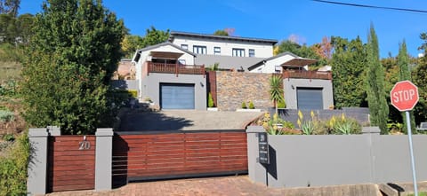 Property building, Property logo or sign, Property logo or sign, View (from property/room), Street view