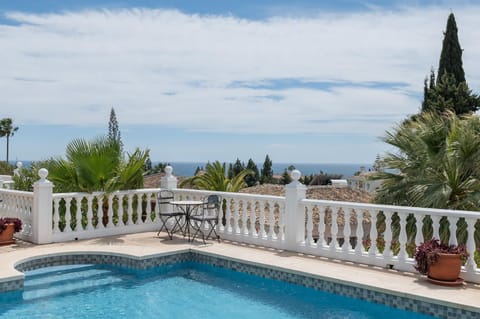 Property building, Living room, Swimming pool