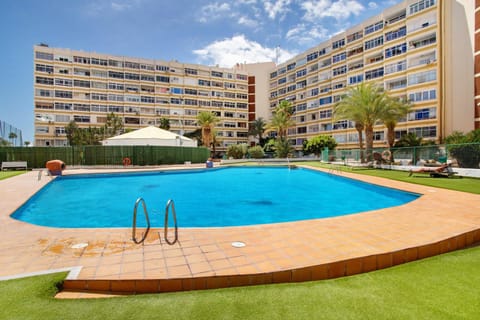 Property building, Living room, Swimming pool