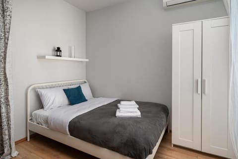 Bed, Photo of the whole room, Bedroom, towels, wardrobe, air conditioner