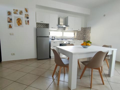 Kitchen or kitchenette, Dining area, oven, stove, air conditioner