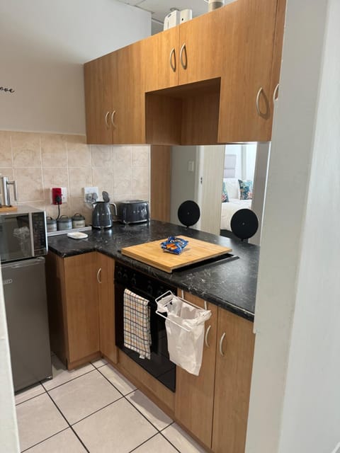 Kitchen or kitchenette, stove, toaster