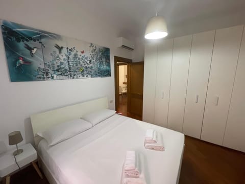 Bed, Photo of the whole room, Decorative detail, Bedroom, towels, wardrobe, air conditioner