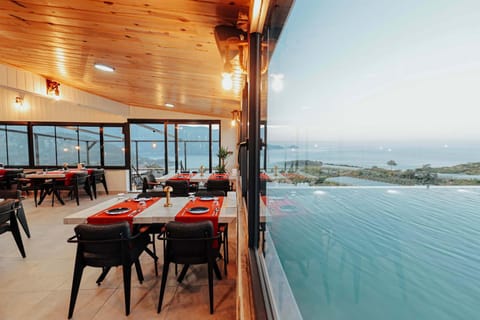 Natural landscape, Dining area, Sea view, Swimming pool