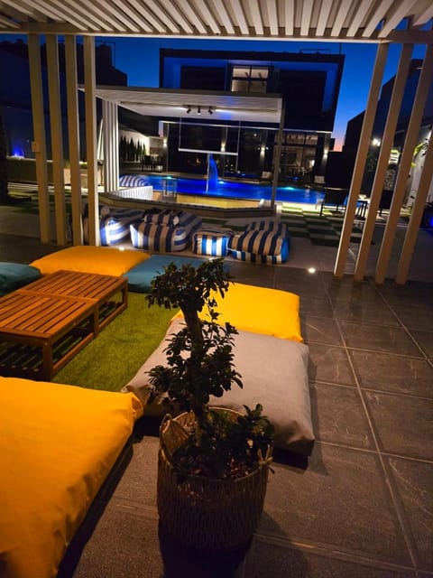 Property building, Patio, Night, Seating area