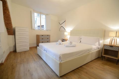 Bed, Photo of the whole room, towels, wardrobe