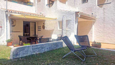 Property building, Patio, Seating area, Dining area