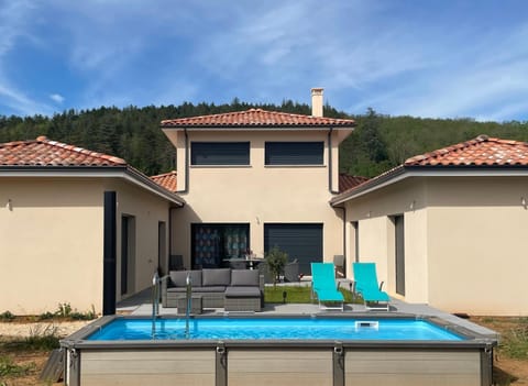 Property building, Patio, Pool view, Swimming pool, sunbed