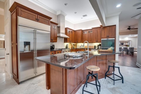 Golf Cart included! Waterfront home with Private Boat Dock Heated Pool and Game Room House in Holmes Beach