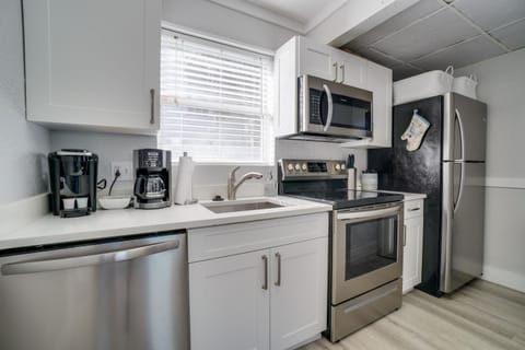 Seagrass Flats 1 located less than 75 steps to the White Sandy Beaches House in Bradenton Beach