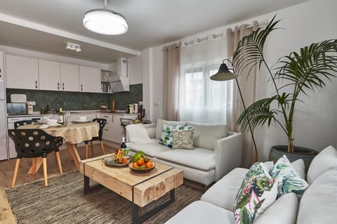 Kitchen or kitchenette, Living room, Seating area, stove