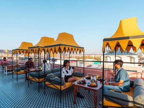 Restaurant/places to eat, View (from property/room), Balcony/Terrace, Seating area, Food