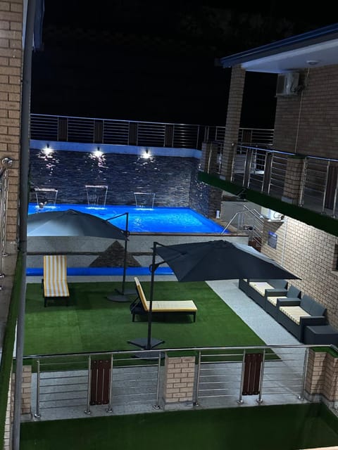 Night, Pool view, Swimming pool, sunbed