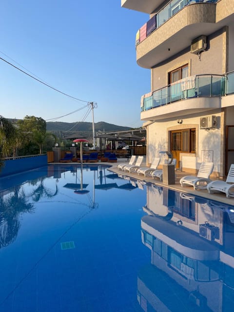 Property building, Patio, Day, Natural landscape, View (from property/room), Balcony/Terrace, Mountain view, Pool view, Swimming pool, sunbed