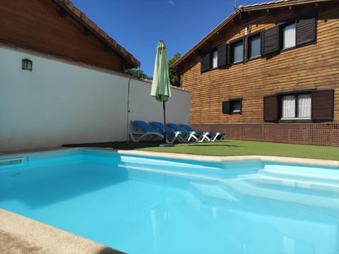Property building, Living room, Swimming pool