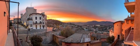 Property building, Nearby landmark, Day, Natural landscape, City view, Mountain view, Sunrise, Sunset