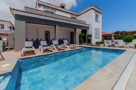 Property building, Living room, Swimming pool