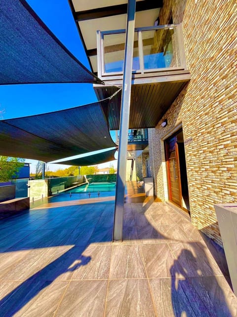 Property building, Patio, Day, View (from property/room), Balcony/Terrace, Pool view, Swimming pool