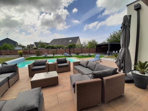 Patio, Day, Living room, Seating area, Pool view, Swimming pool, sunbed