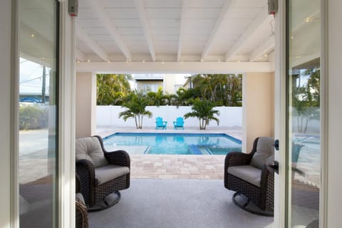 Patio, Seating area, Pool view, Swimming pool
