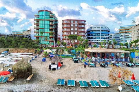 Property building, Day, Natural landscape, Beach, City view