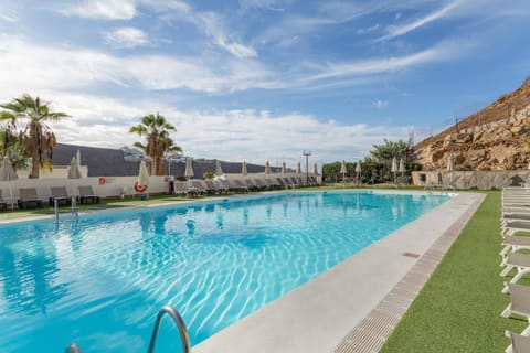 Property building, Living room, Swimming pool