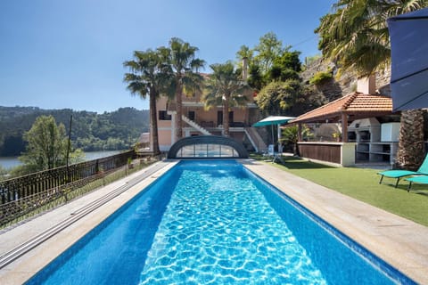 Property building, Living room, Swimming pool
