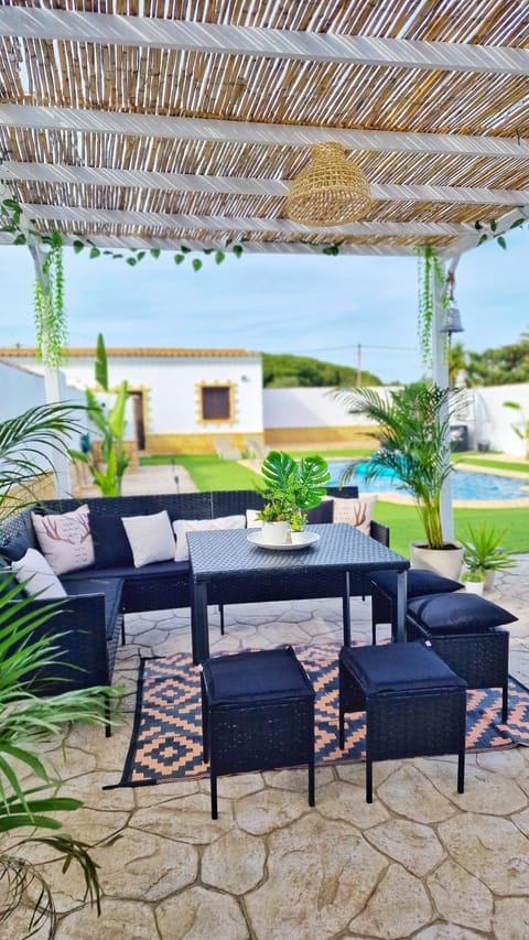 Patio, Day, Garden, View (from property/room), Balcony/Terrace, Living room, Seating area, Dining area, Garden view, Pool view, Swimming pool, sunbed