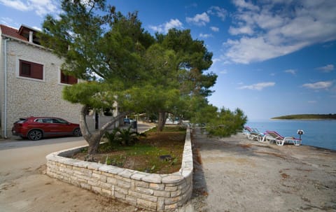 Property building, Spring, Day, Natural landscape, Beach, Sea view, Parking