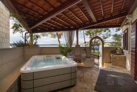 Patio, Facade/entrance, Day, Hot Tub, Balcony/Terrace, Sea view