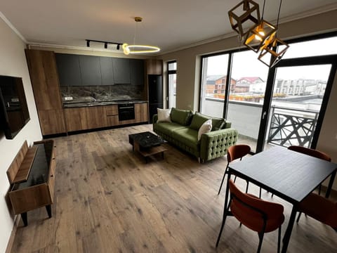 Kitchen or kitchenette, Living room, Seating area, Dining area