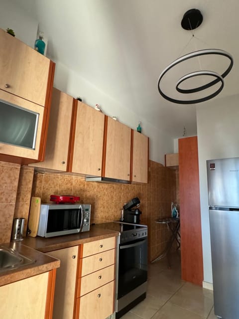 Coffee/tea facilities, Kitchen or kitchenette, flat iron, microwave, stove, stove, toaster, kitchen