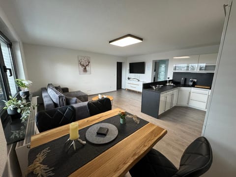 Kitchen or kitchenette, Living room, Seating area, Dining area