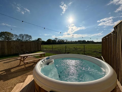 Lois' Pod with Hot Tub, Near Airport Campground/ 
RV Resort in Wales